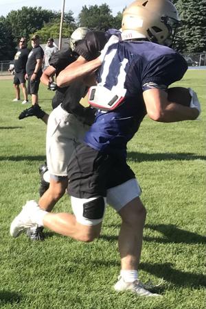 No time to rest: New Prairie baseball players make quick transition to football after state championship