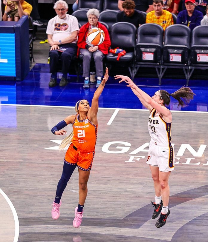 Magic Johnson admires how Caitlin Clark and Angel Reese deal with the hype while uplifting the WNBA 